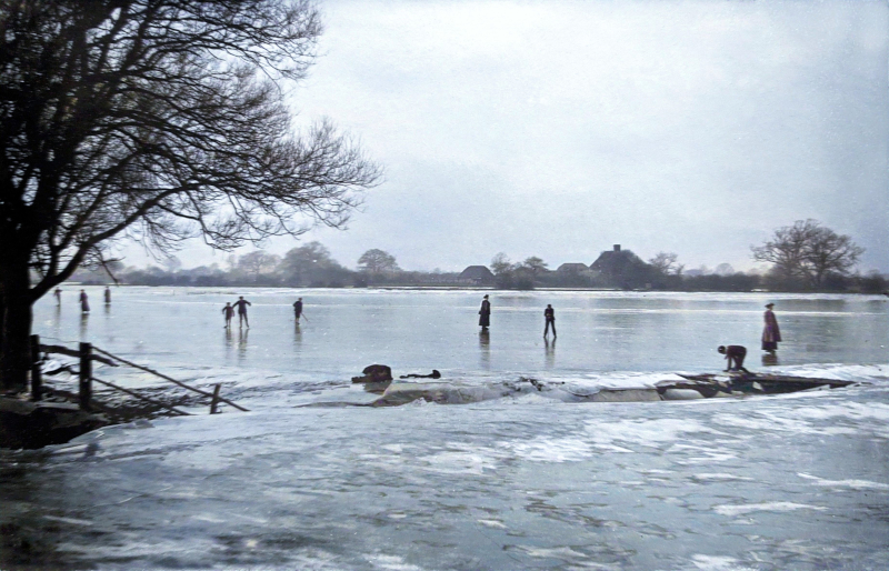 A photo of people skating on the frozen floods.
